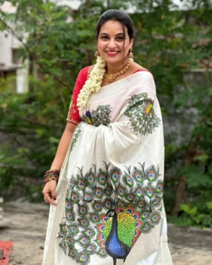 Silver Tissue Saree with Majestic Peacock Print